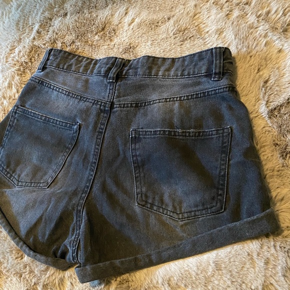 Black jean shorts, bottoms folded brand labeled Urban planet. - Picture 2 of 2